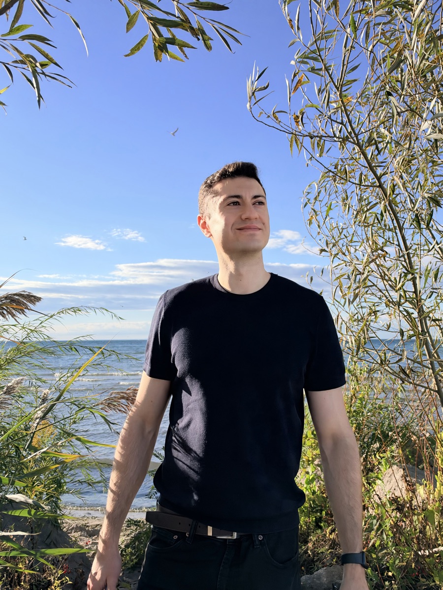 Ilan Portnoi outdoors by the water